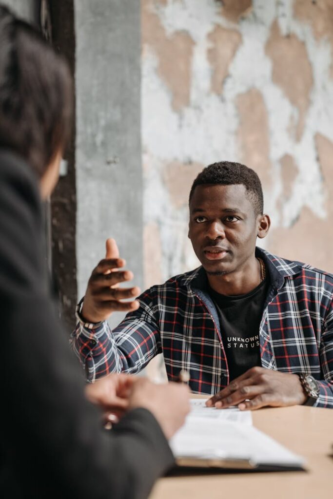 A Man Talking to a Lawyer