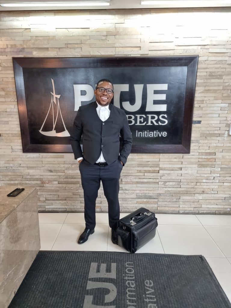 B Mthembu in lawyer outfit